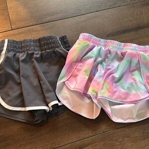 Set of 2 running shorts for girls size Medium. With brief liner.